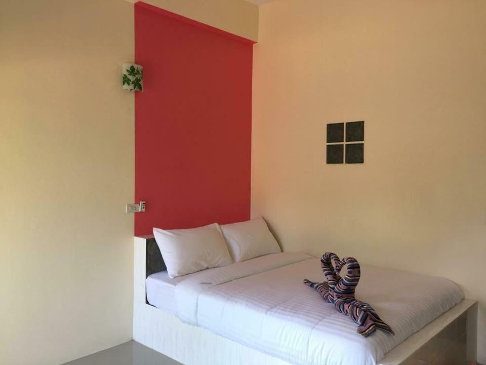 Budchui Guesthouse Тау Экстерьер фото