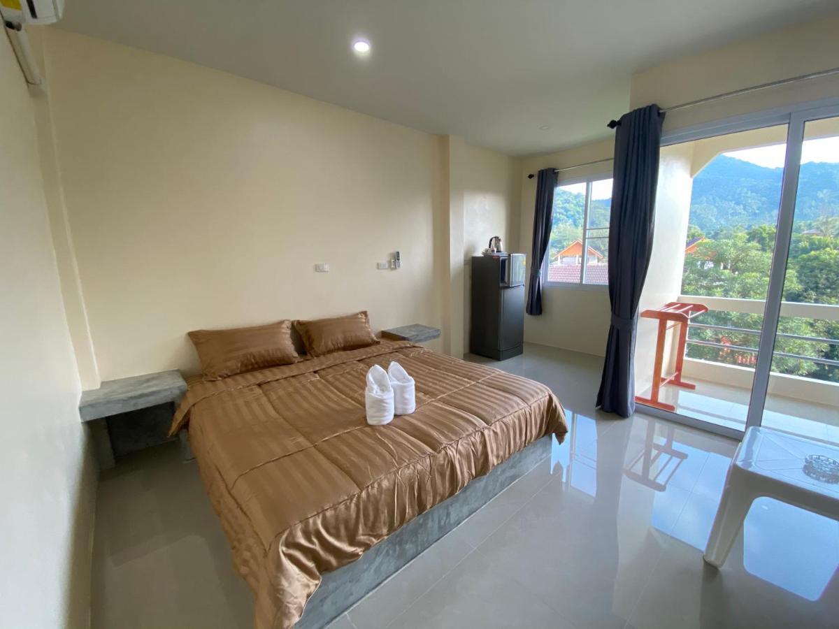 Budchui Guesthouse Тау Экстерьер фото