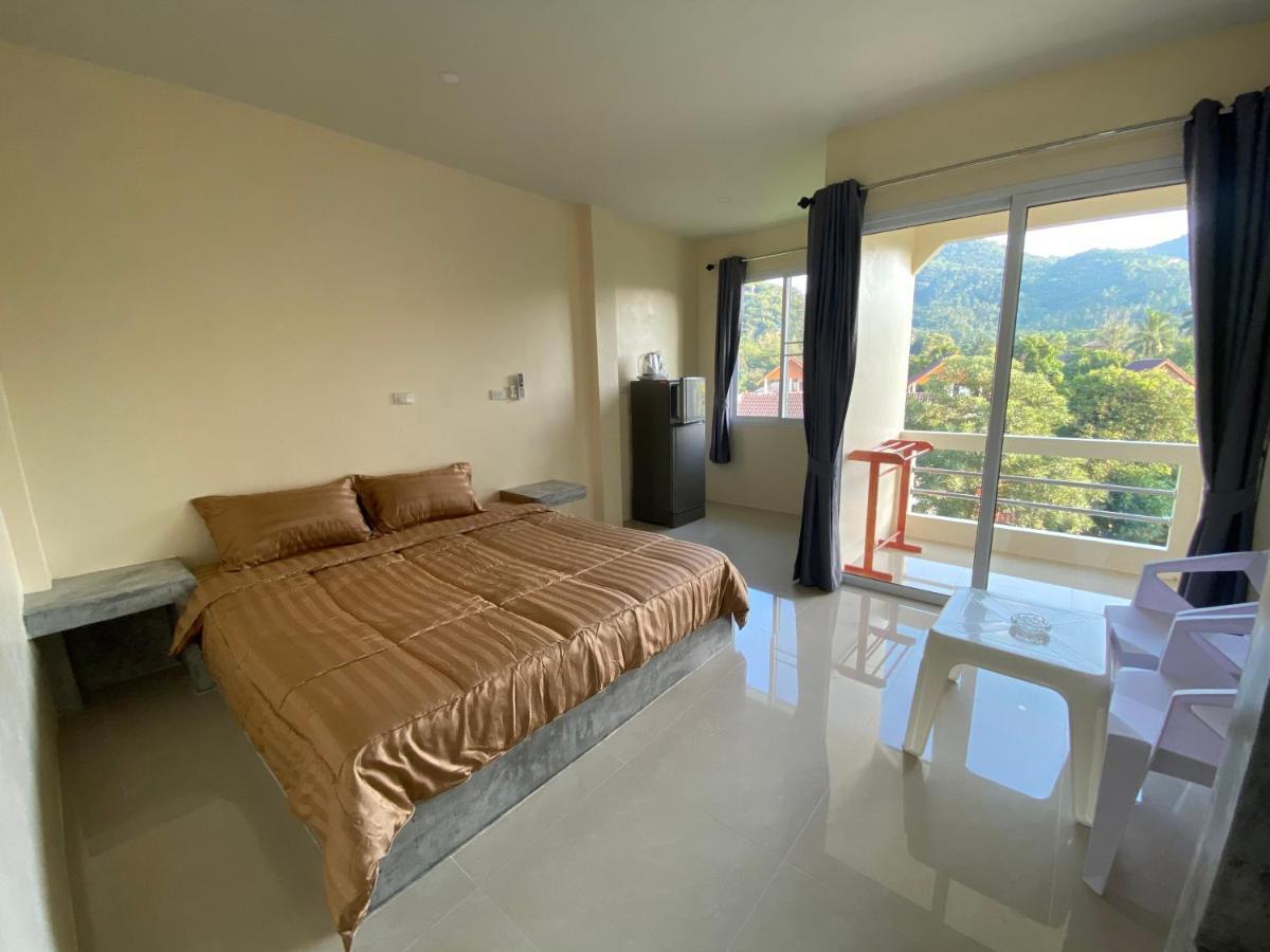 Budchui Guesthouse Тау Экстерьер фото